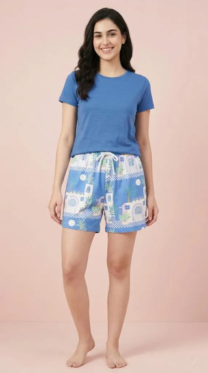 Sky blue printed high waisted bermuda shorts for women — front view on model
